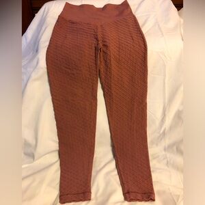 Women’s honey brown leggings. Excellent condition  size Med. Pattern
